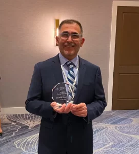 Al Mercardo Receives Award